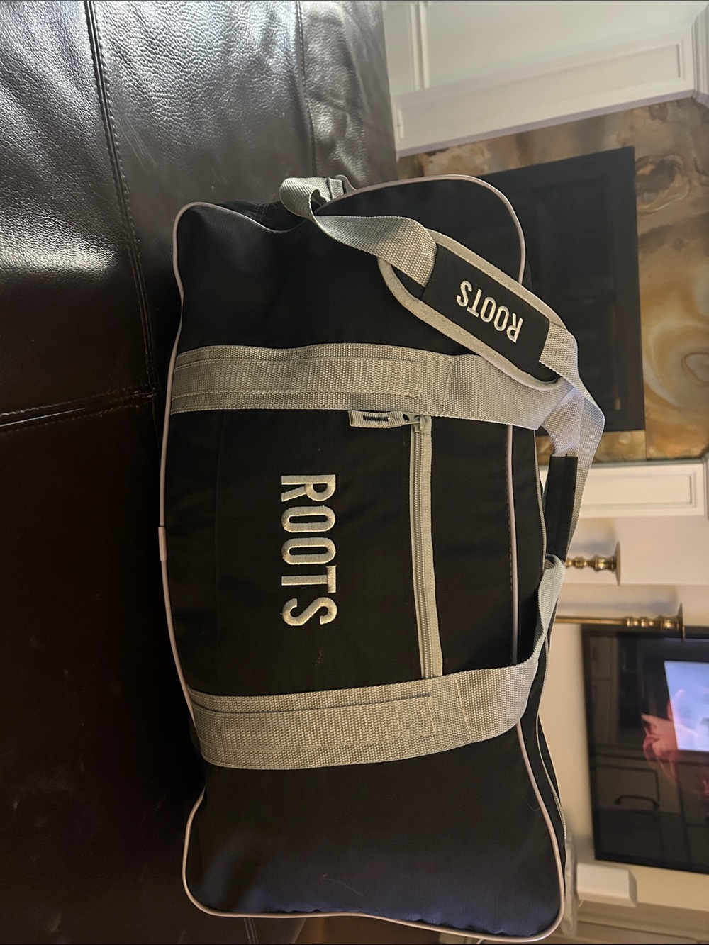 Roots Black Duffel Bag with Light Gray Straps